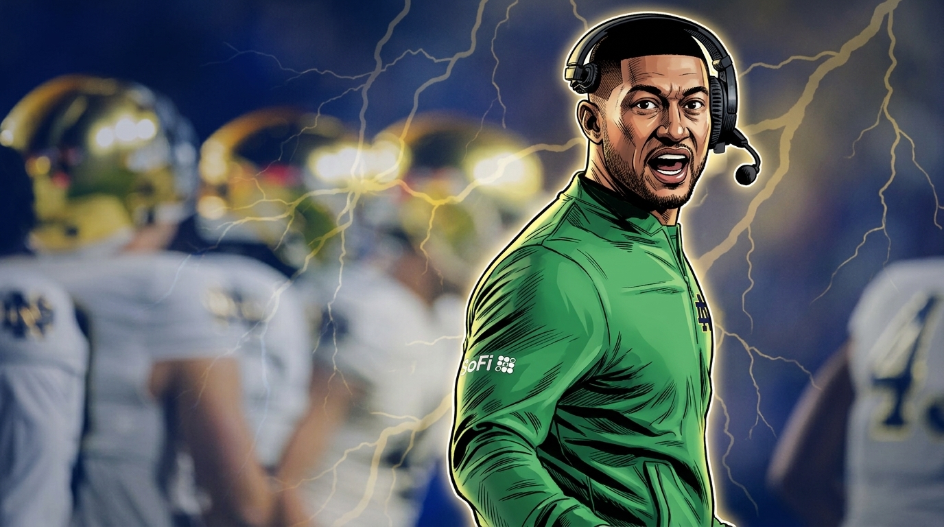 Marcus Freeman shouts from the sideline in a green Notre Dame quarter-zip with his headset on — Swipe Sports